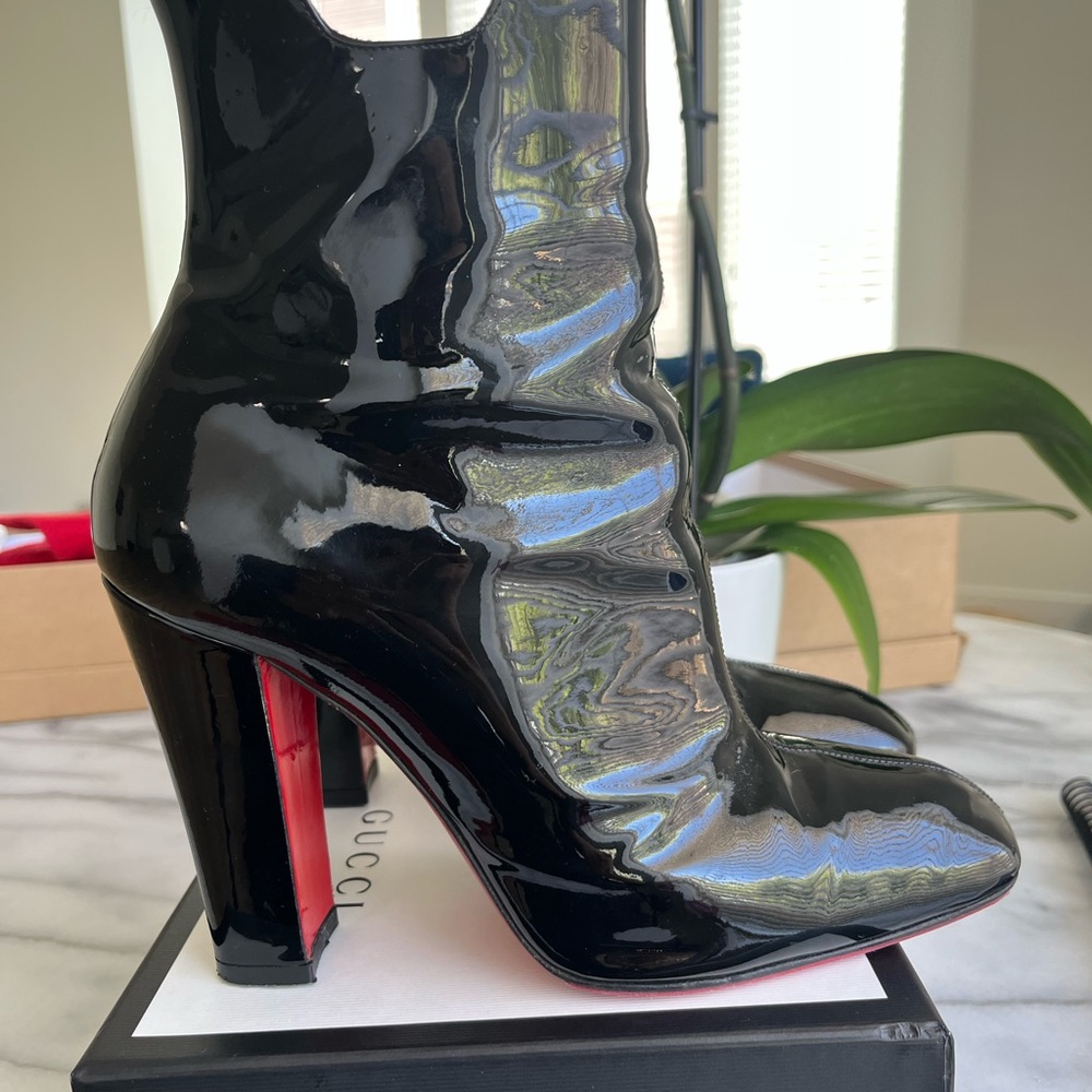 Christian Louboutin Black Heeled Boots with Red Sole